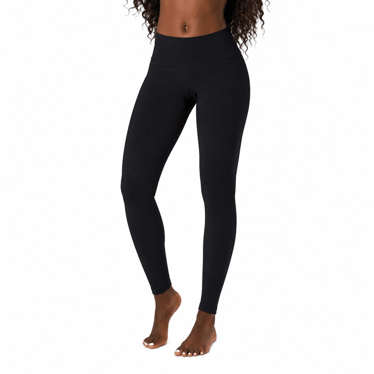 model in some black leggings on a white background