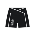 Black athletic shorts with a white logo on a white background