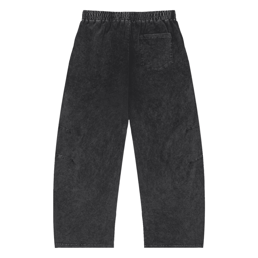 Black pants with 'ETHER' and 'REAL' text on a white background