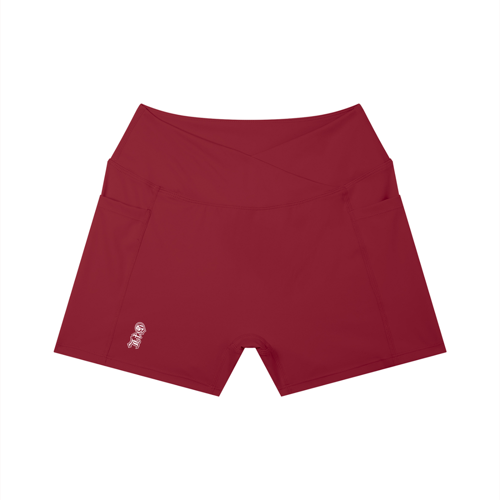 Red shorts with a small logo on a white background
