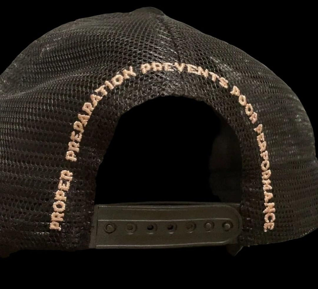 Black mesh cap with text on a black background