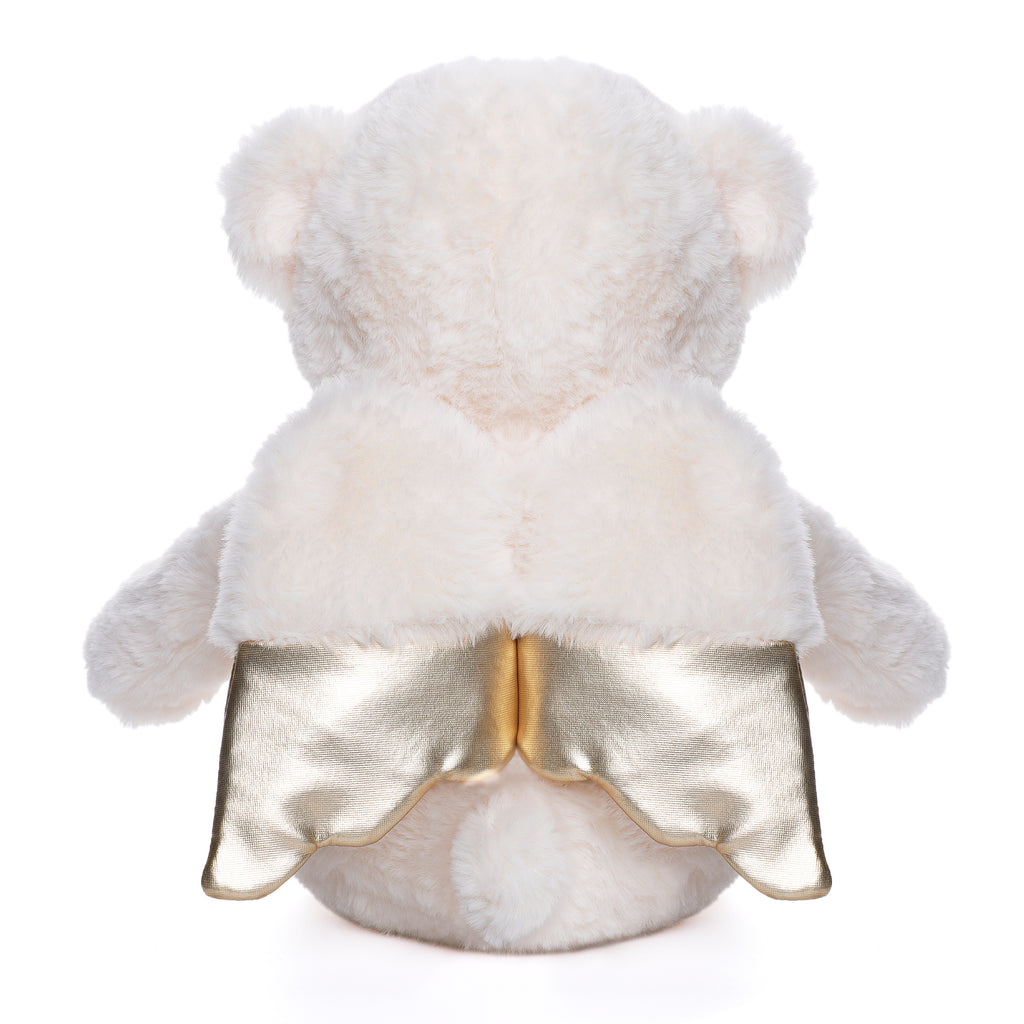 White teddy bear with a gold skirt on a white background