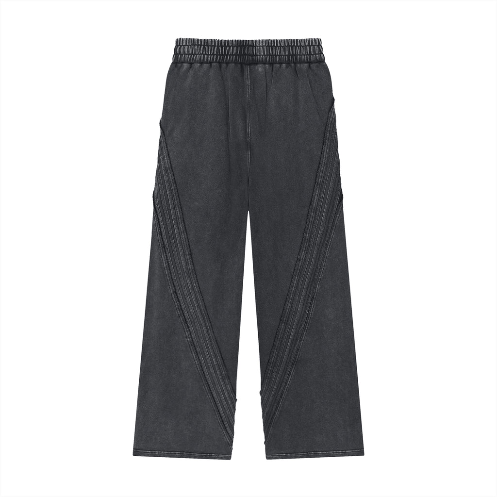 Black pants with pleated design on a white background
