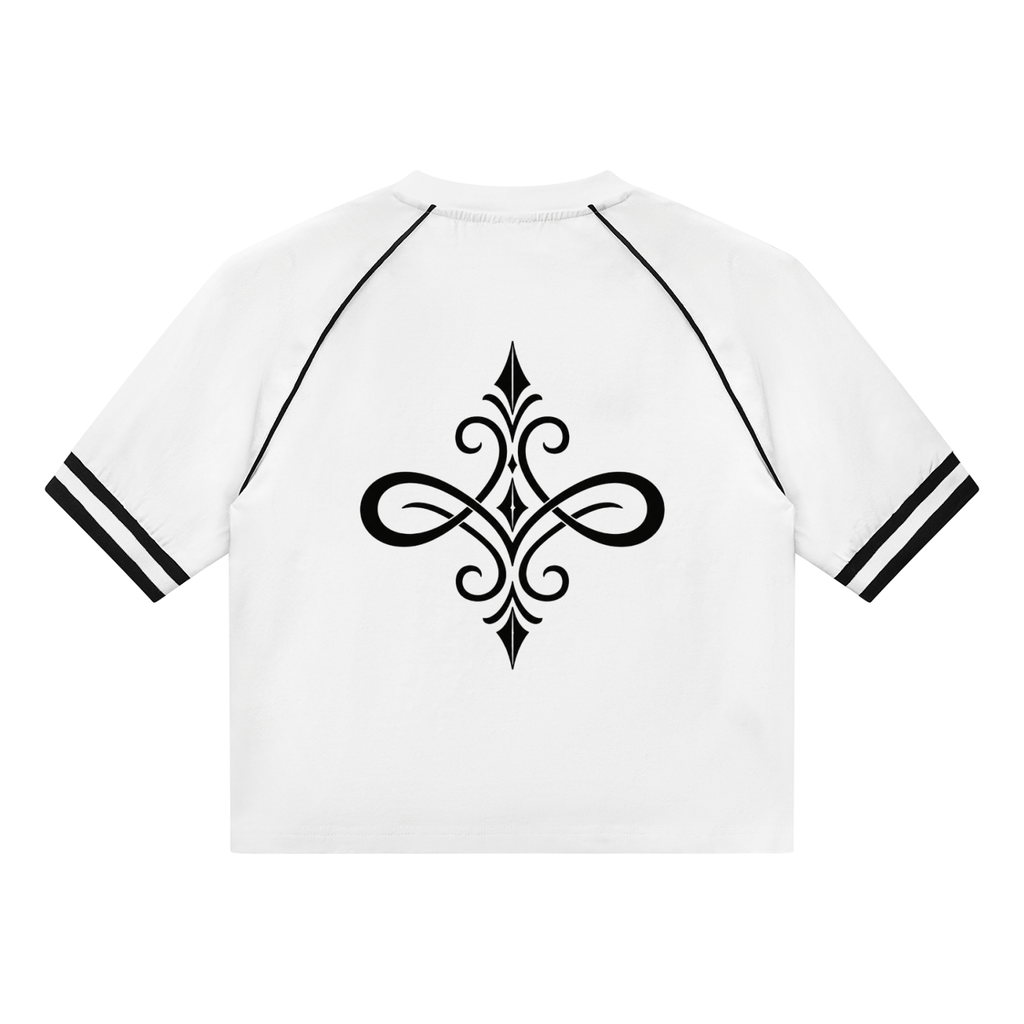 A white short-sleeve crop top with black double stripes on the sleeves and a large black ornamental graphic printed on the back, shown against a plain white background.