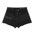 Black denim shorts with a decorative cutout on a white background