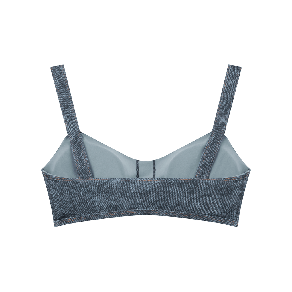 Gray sports bra with 'Bacca Bucci' branding on a white background
