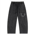 Dark gray pants with a logo on a white background