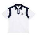 A white short-sleeve polo shirt with dark navy blue contrast panels on the collar, placket, shoulders, and sleeves, featuring a small black embroidered cross-like logo on the left chest.
