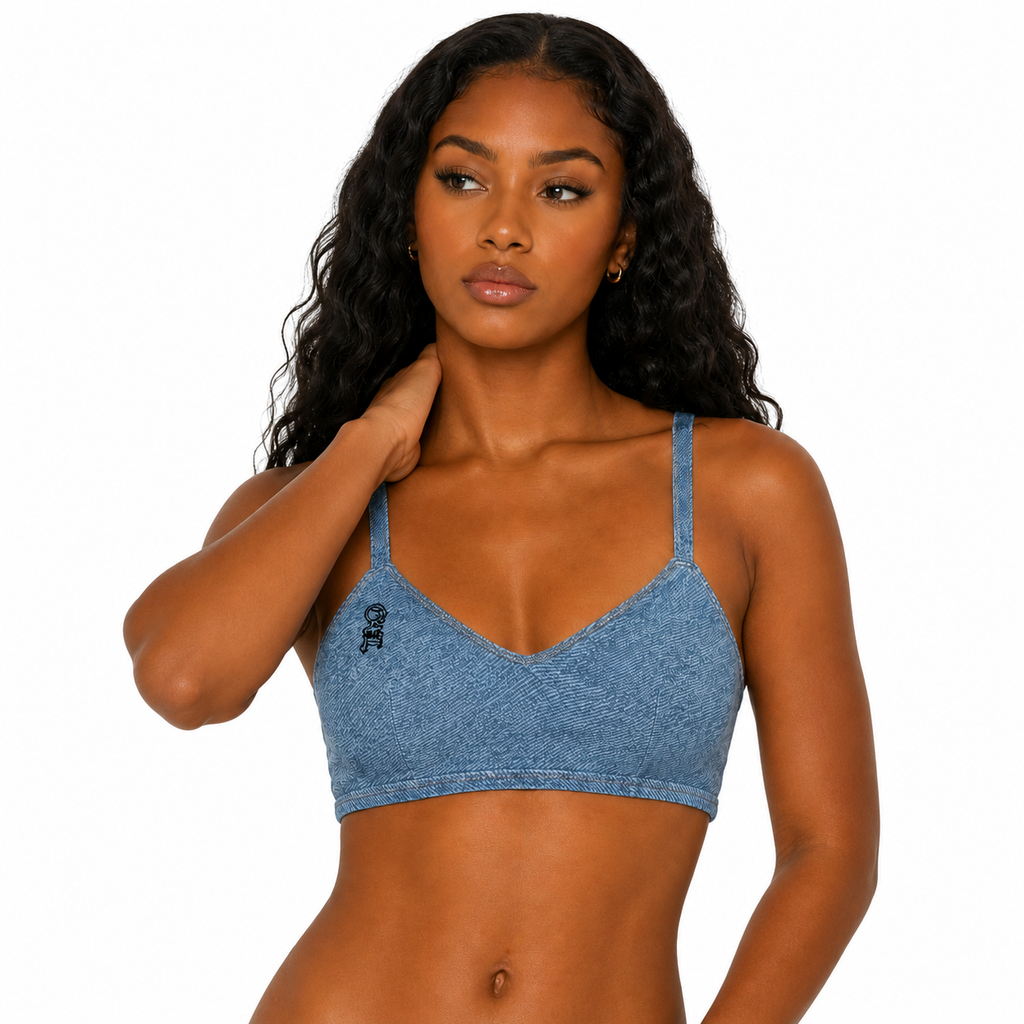 Woman wearing a blue sports bra on a white background