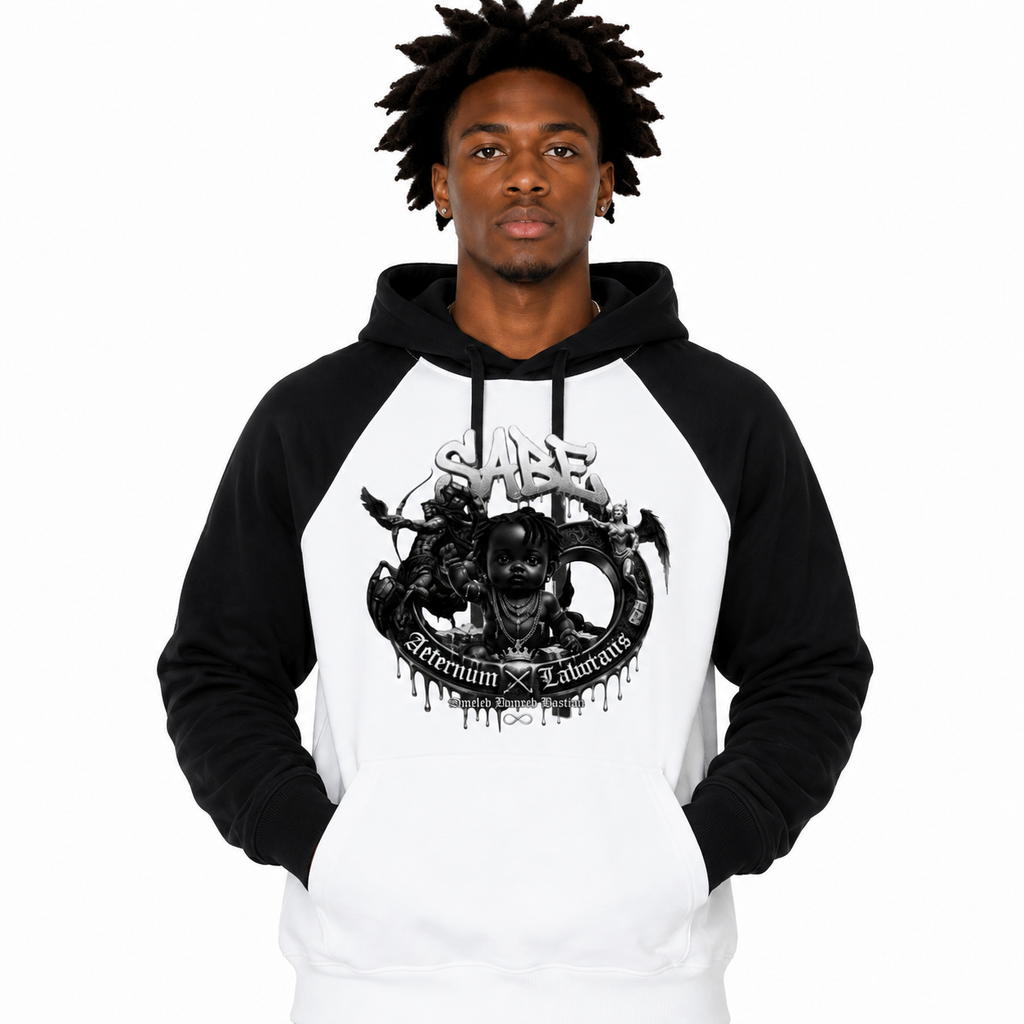 Person wearing a black and white hoodie with graphic design on a white background