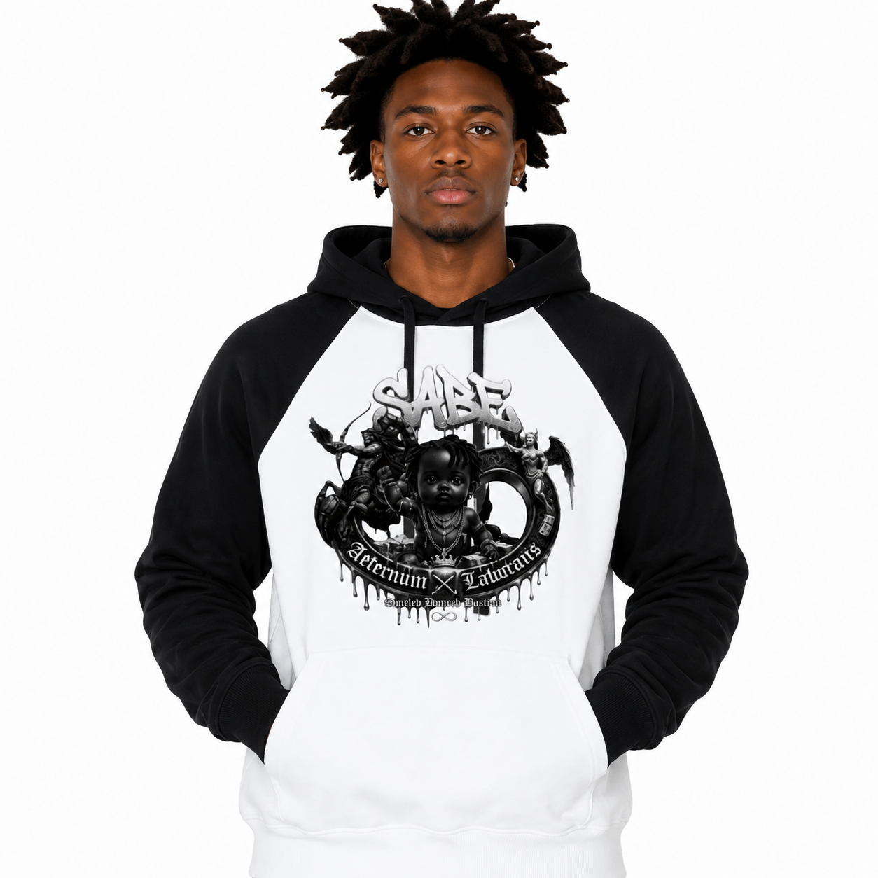 Person wearing a black and white hoodie with graphic design on a white background