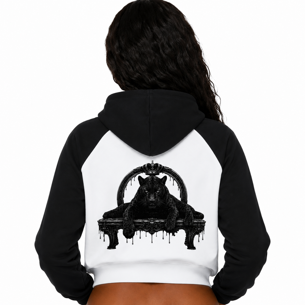 Black and white hoodie with a bear graphic on the back, worn by a person.