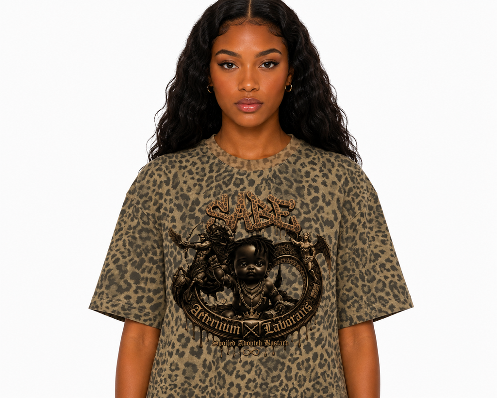 Woman wearing a leopard print t-shirt with a graphic design on a white background