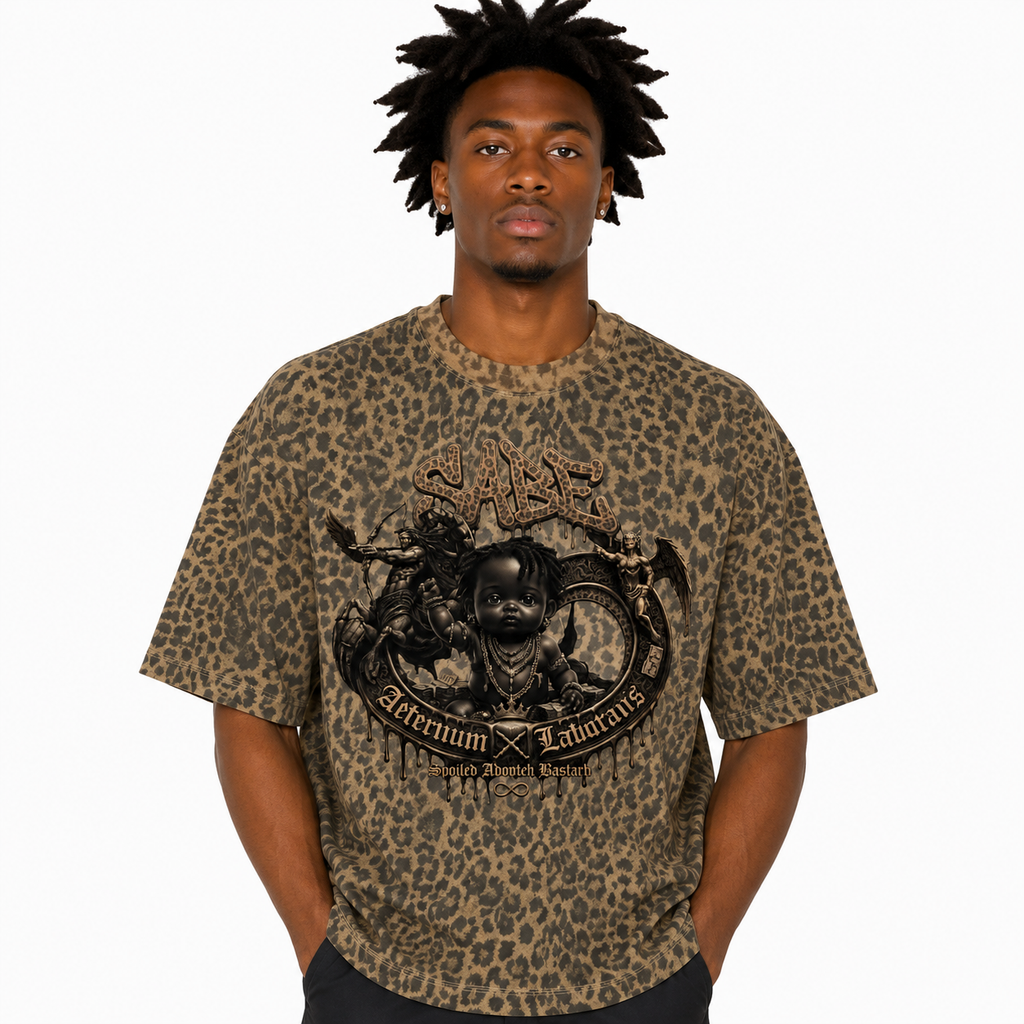 Person wearing a leopard print t-shirt with graphic design on a white background