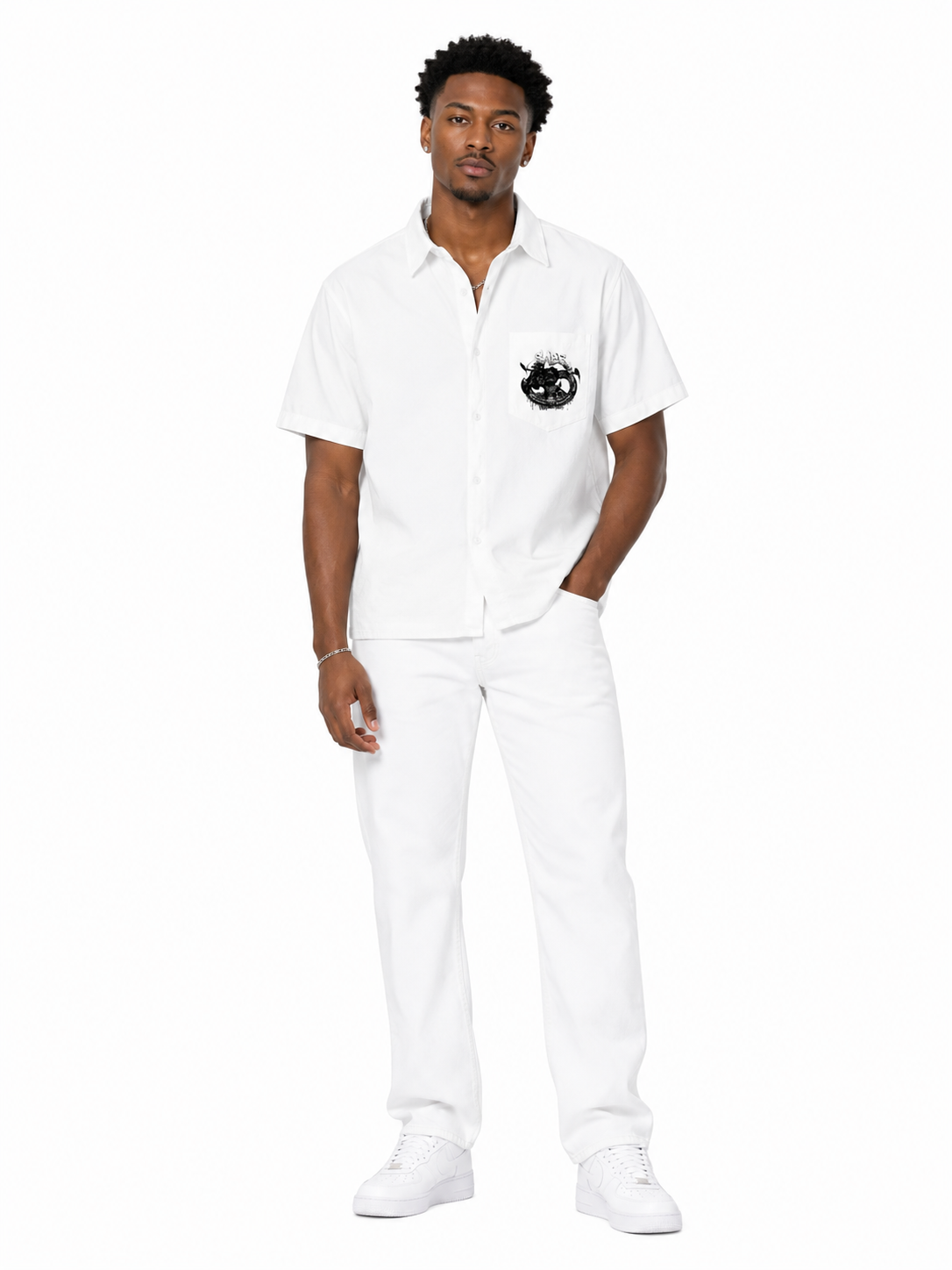 Man wearing a white shirt and pants with a logo on a white background