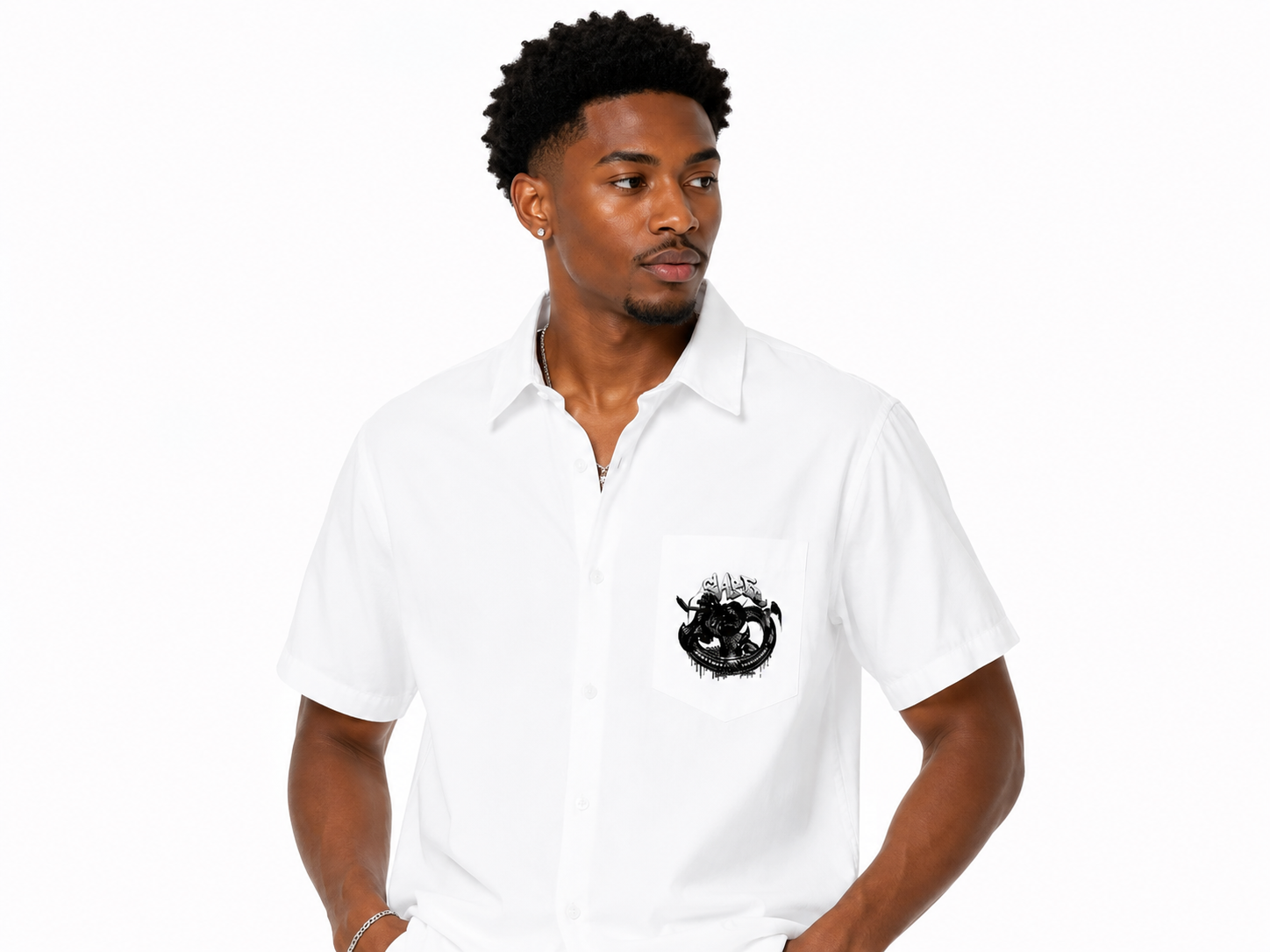 Man wearing a white polo shirt with a logo on a white background