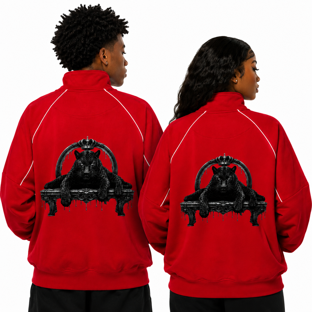 Two people wearing red jackets with a black bear graphic on the back.
