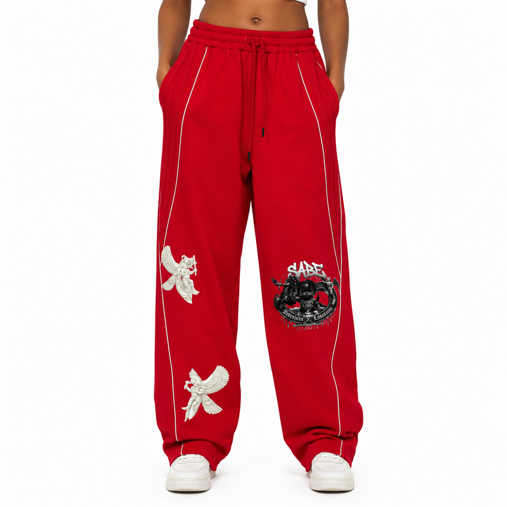 Red sweatpants with white embroidery on a white background