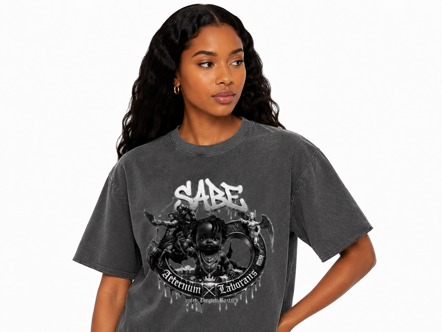 Woman wearing a gray t-shirt with a graphic design on a white background