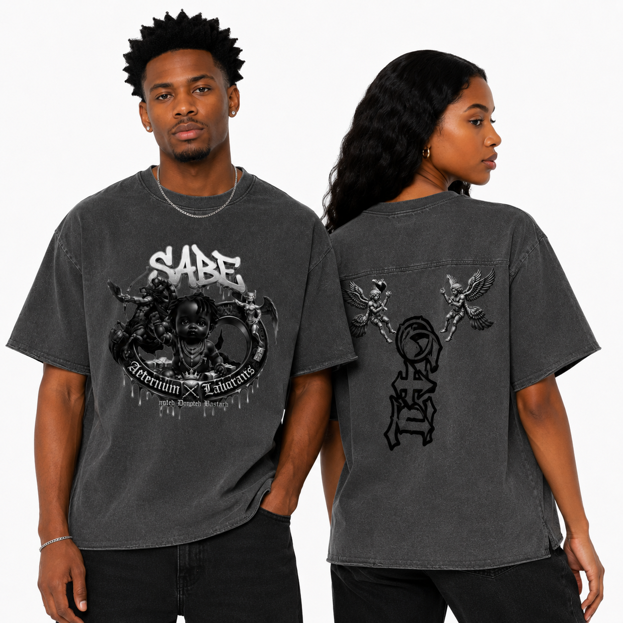 Two people wearing dark gray t-shirts with graphic designs on a white background