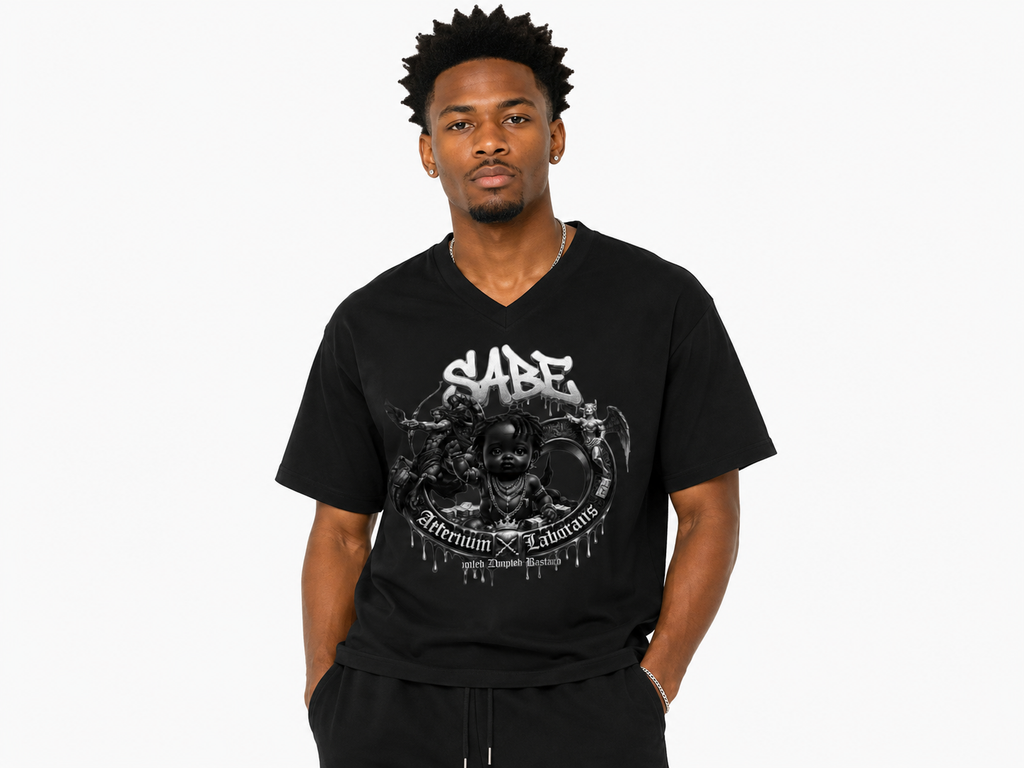 Man wearing a black t-shirt with graphic design on a white background