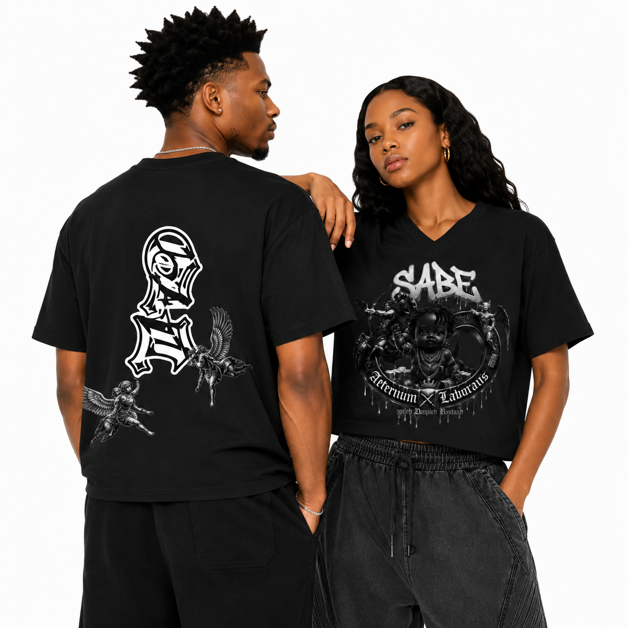 Two people wearing black t-shirts with graphic designs on a white background