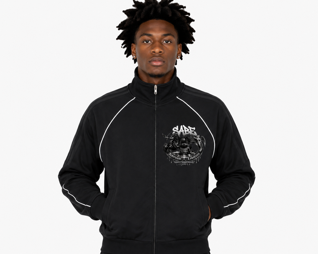 Person wearing a black jacket with a logo on a white background