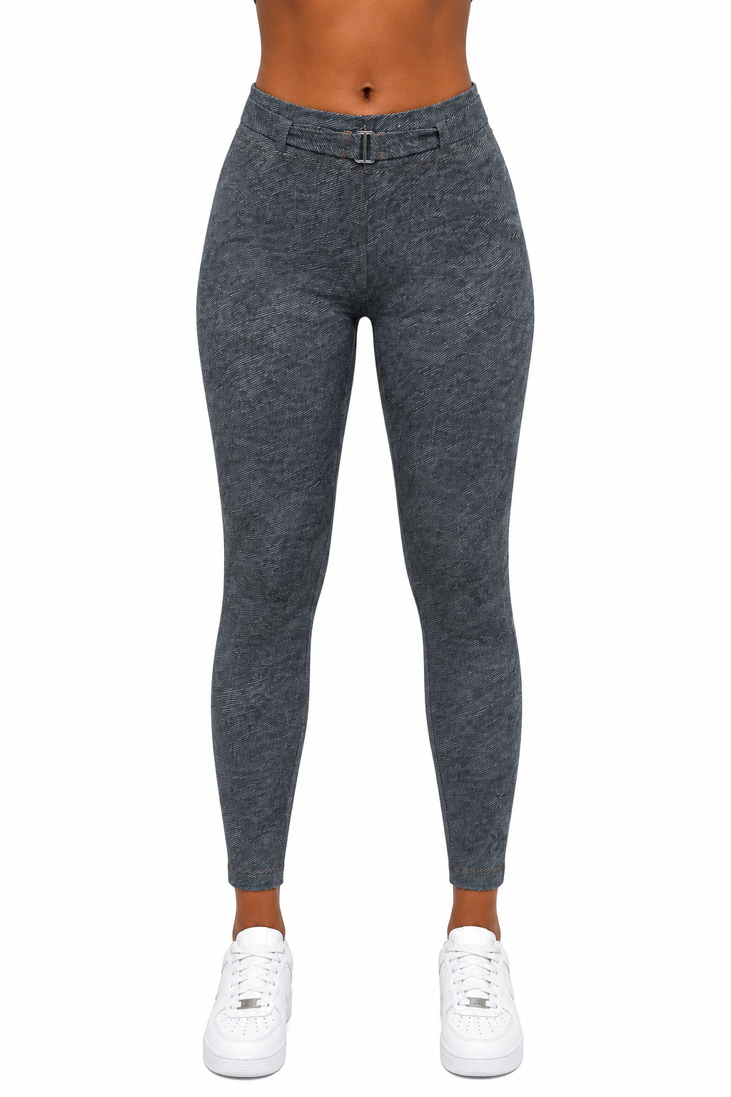 Gray leggings worn by a person on a white background