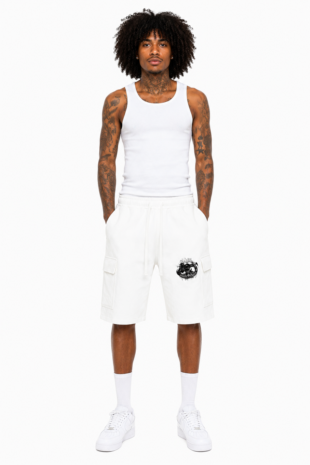 Person wearing a white tank top and cargo shorts on a white background