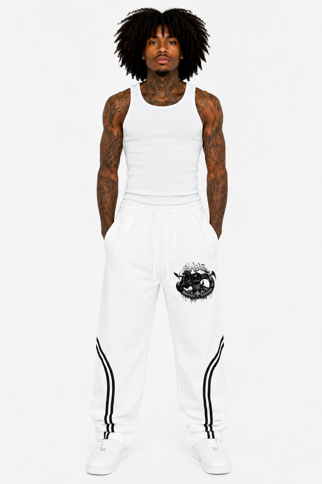 Person wearing a white tank top and pants with a black design on a white background