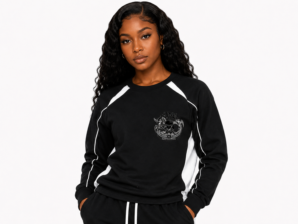 Woman wearing a black and white sweatshirt with a logo on a white background