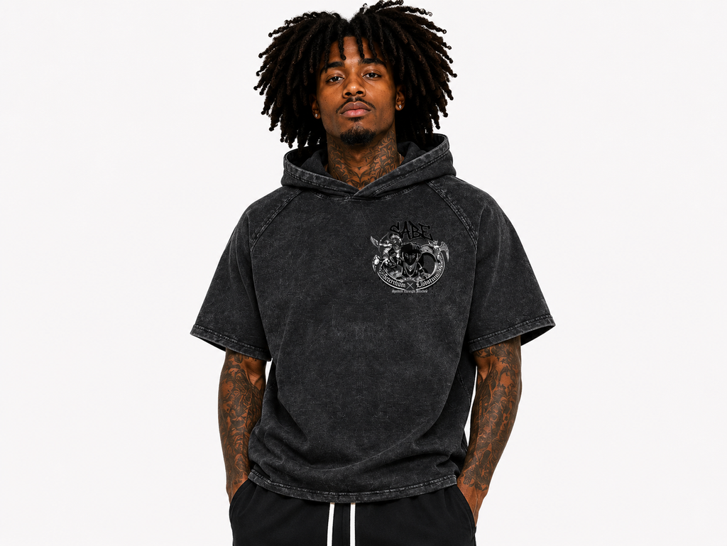 Man wearing a black hoodie with a logo on a white background