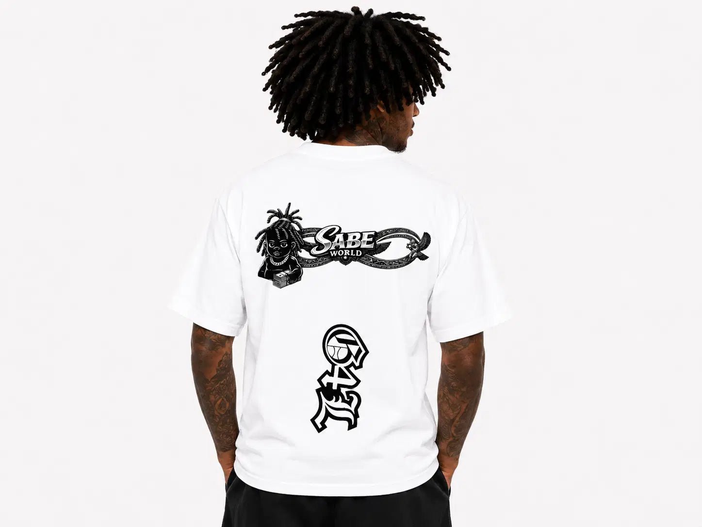 Person wearing a white t-shirt with black graphics and text on a plain background