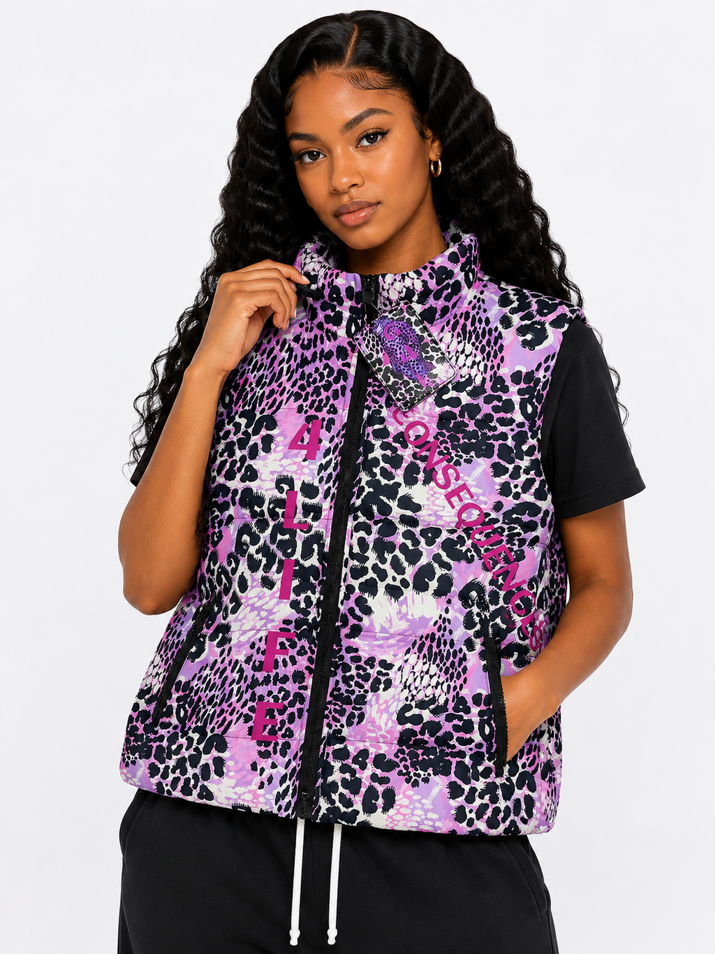 Woman wearing a purple leopard print vest on a white background