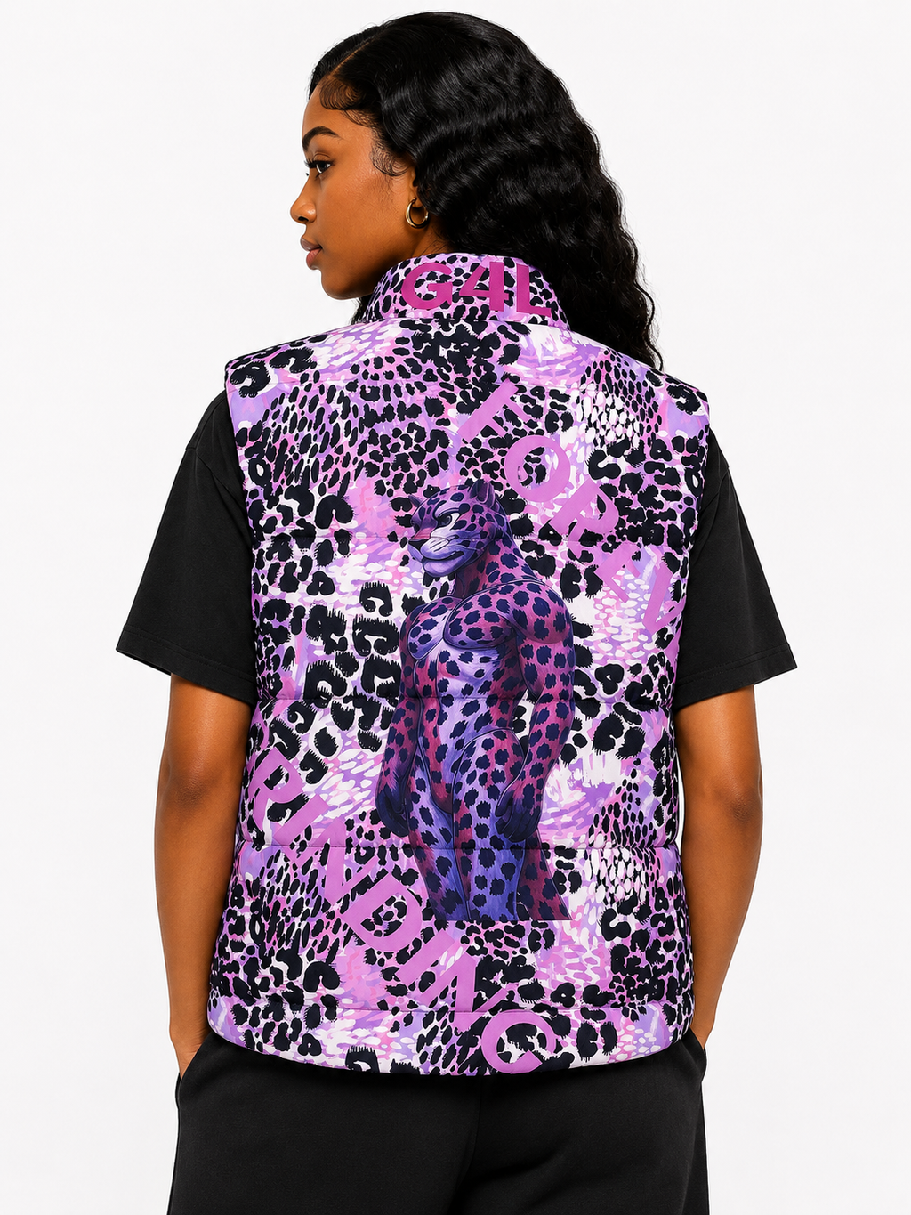 Person wearing a purple and black patterned shirt with a visible brand logo on a white background