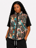 Person wearing a colorful leopard print vest with text on a white background