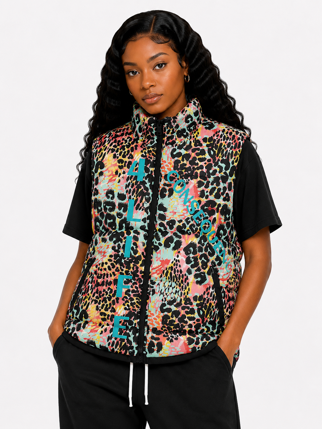 Person wearing a colorful leopard print vest with text on a white background