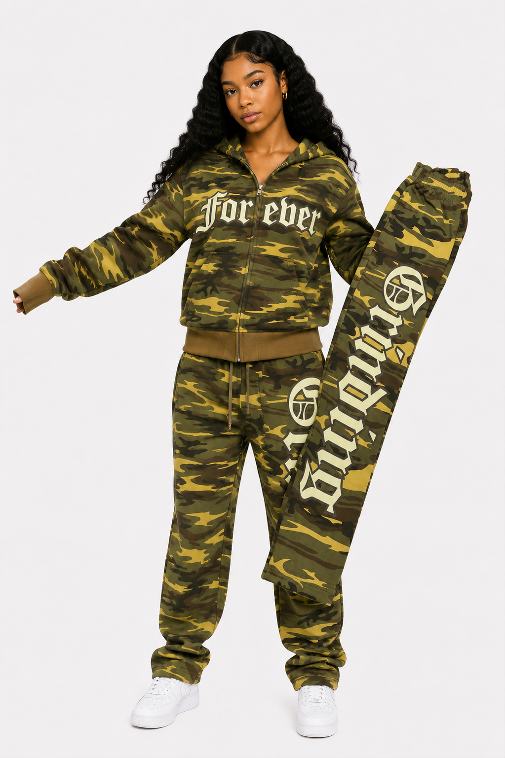 Person wearing a camouflage tracksuit with 'Forever' branding on a white background