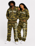 Two people wearing matching camouflage tracksuits with 'Forever' text on a white background