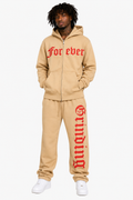 Person wearing a beige tracksuit with red text on a white background