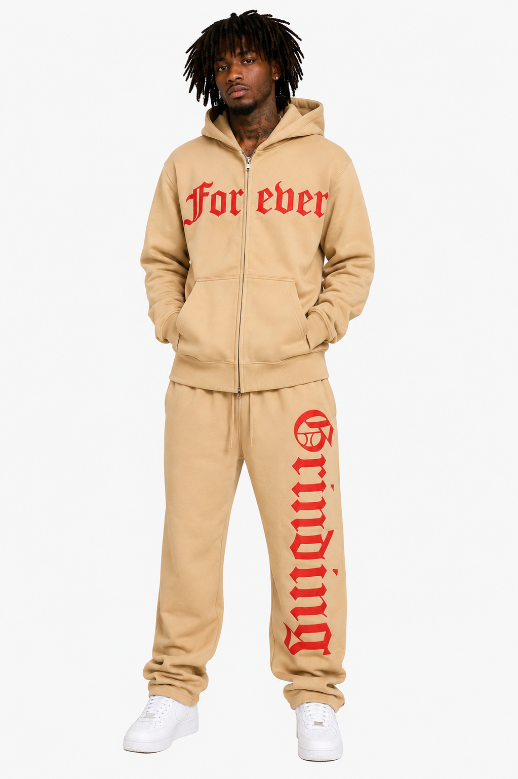Person wearing a beige tracksuit with red text on a white background