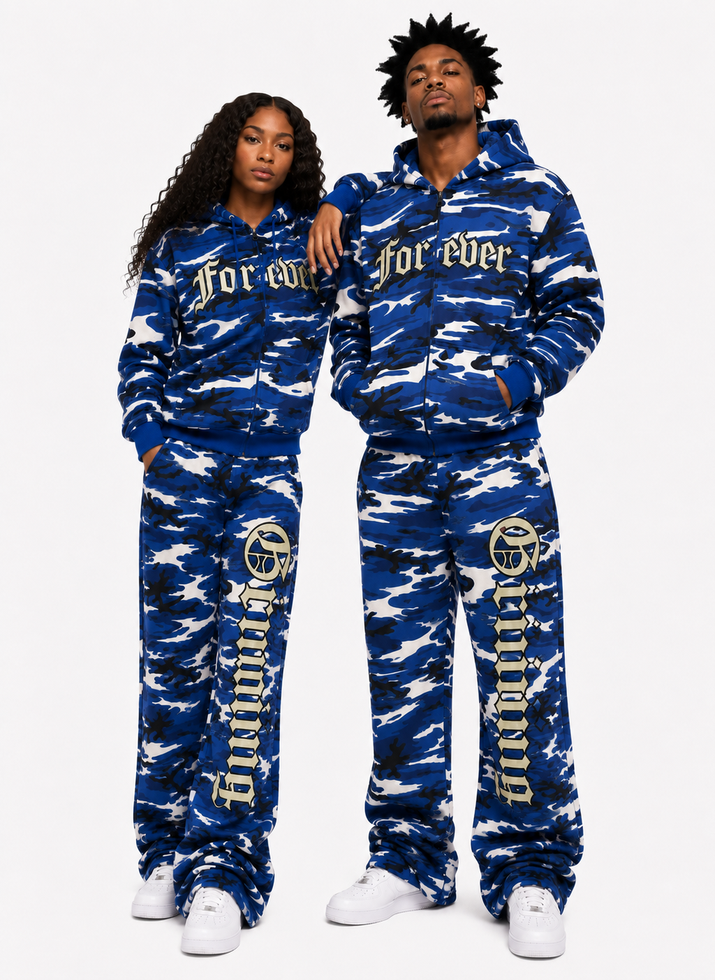 Two people wearing matching blue camouflage outfits with 'Forever' text on a white background