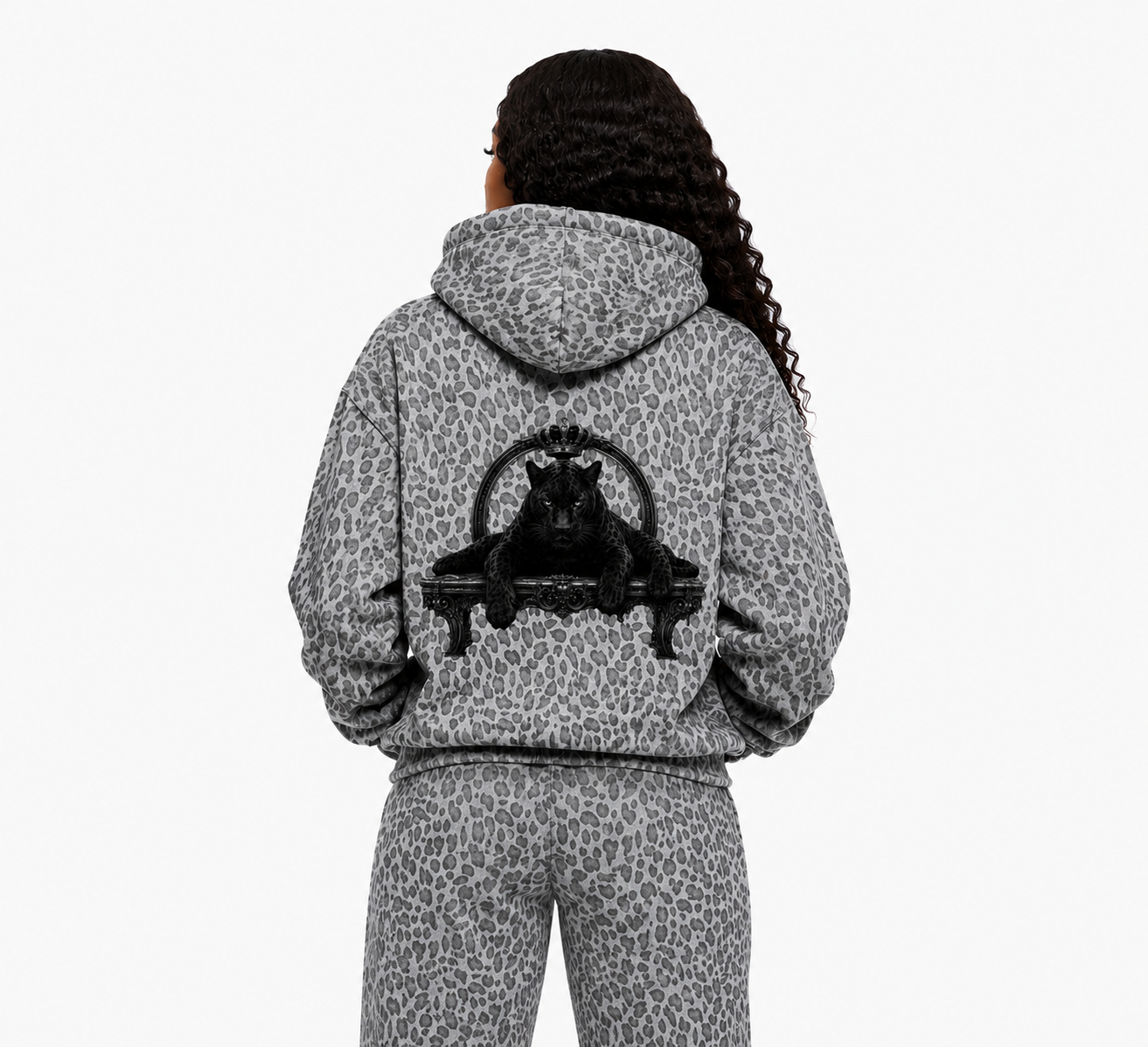 Person wearing a gray leopard print hoodie with a black panther design on the back, on a white background.