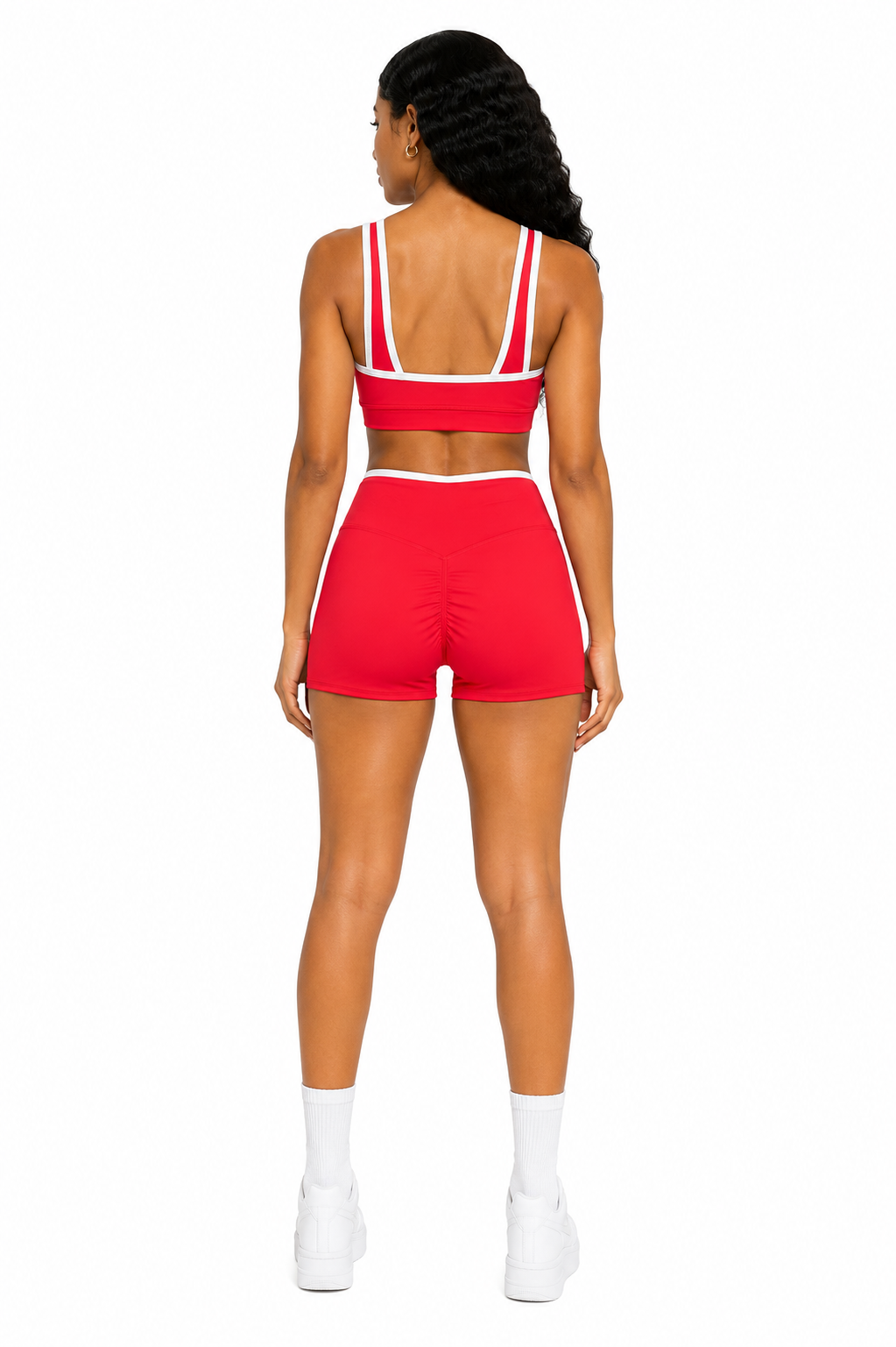 Person wearing a red sports outfit on a white background
