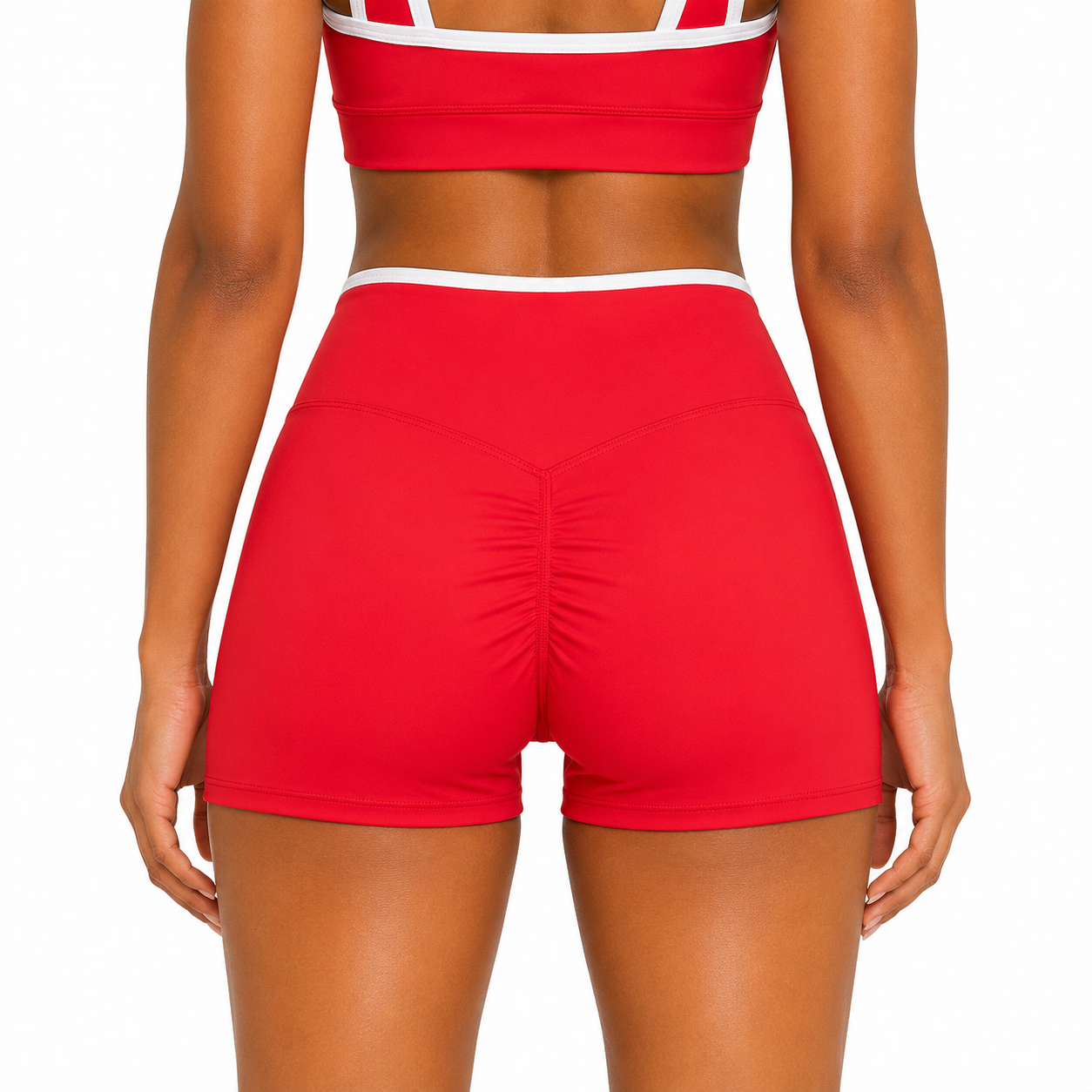 Red athletic shorts with white waistband on a plain background