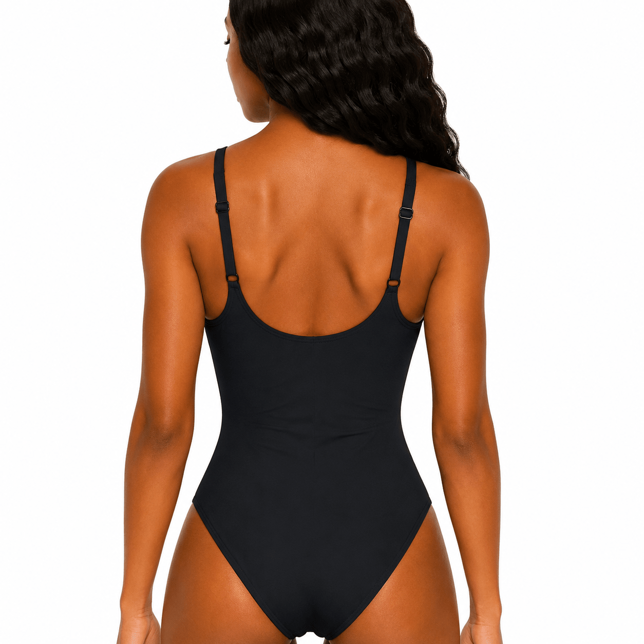 Black swimsuit worn by a model on a white background