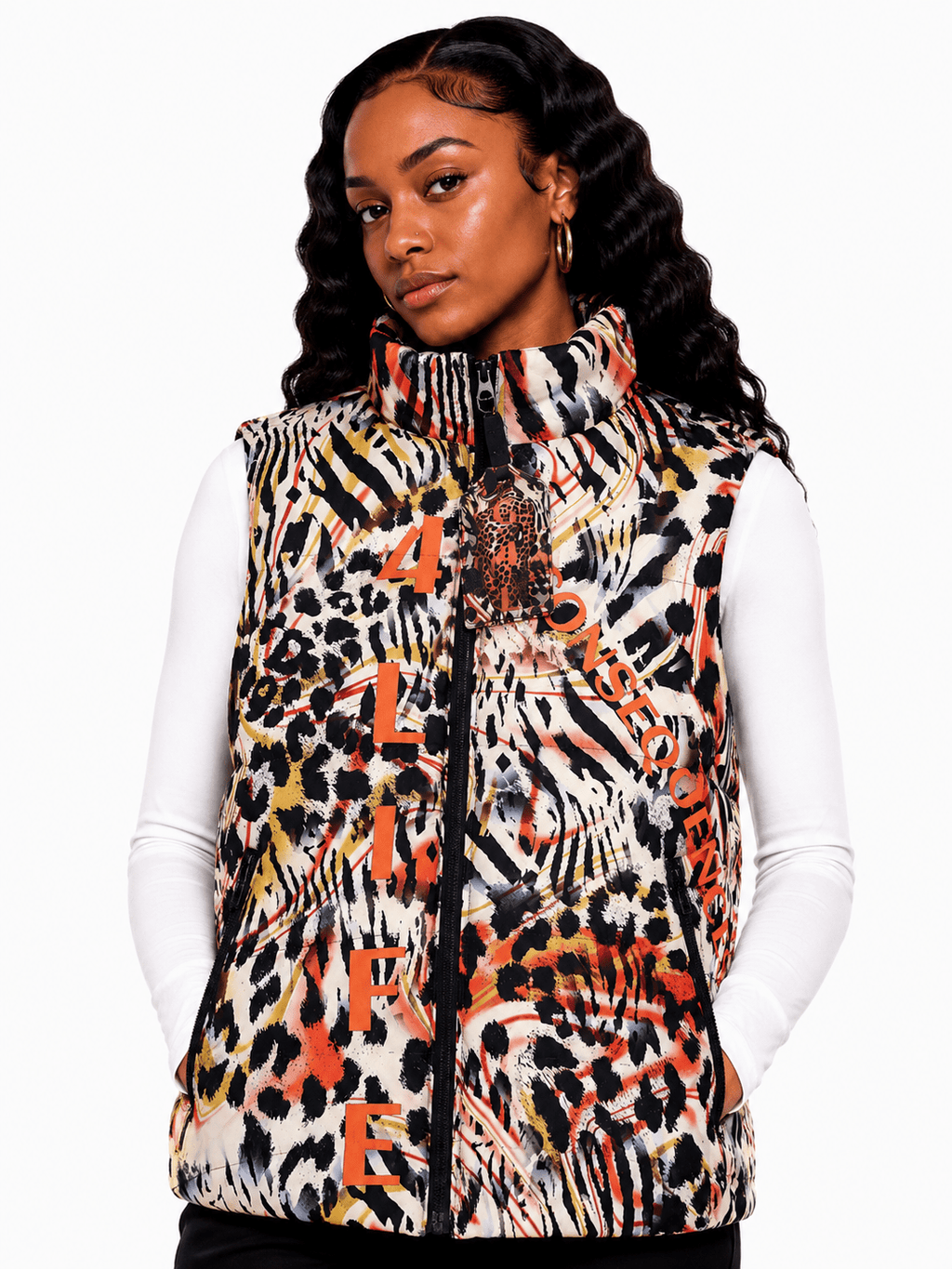 Woman wearing a multicolored patterned vest on a white background