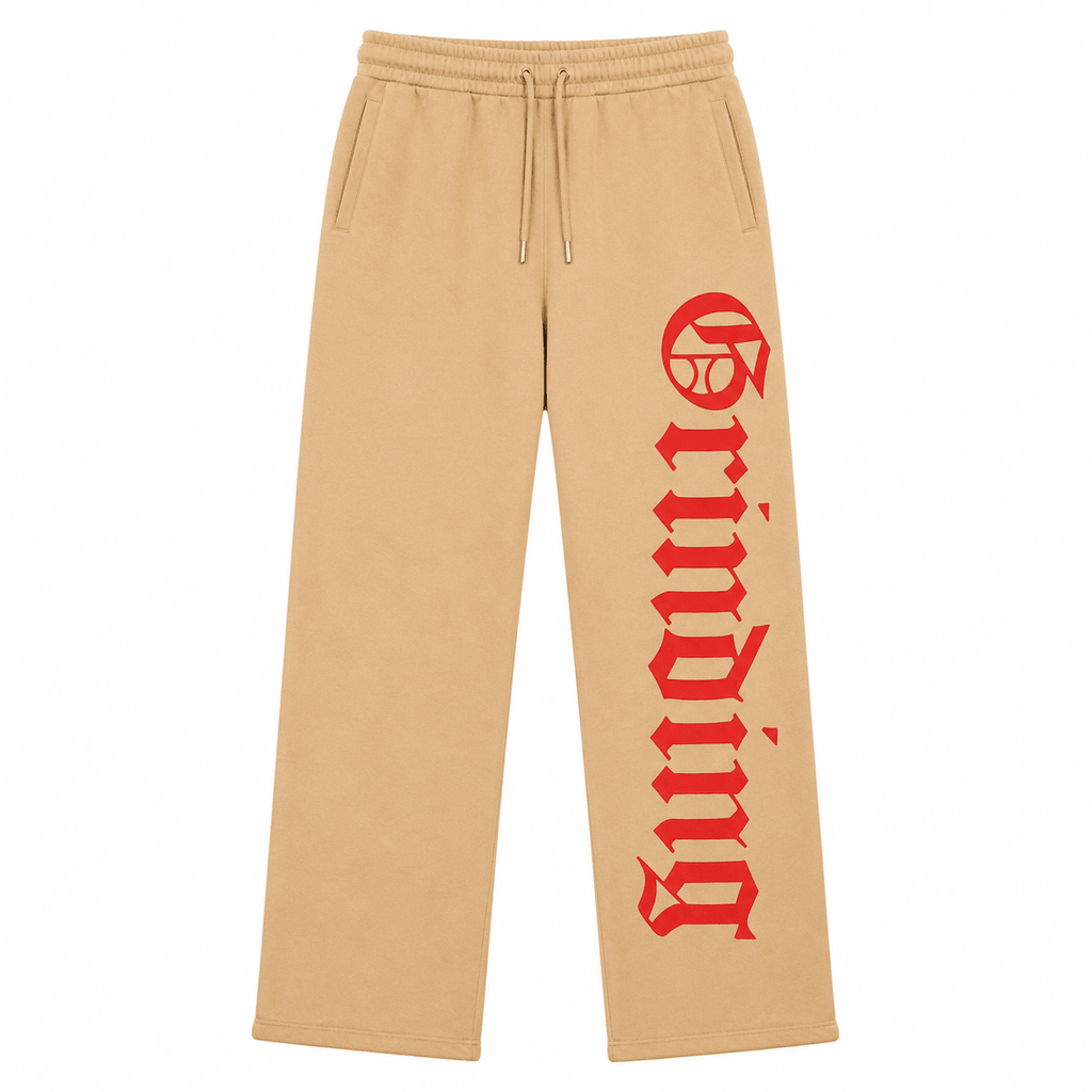 Beige sweatpants with red logo on a white background