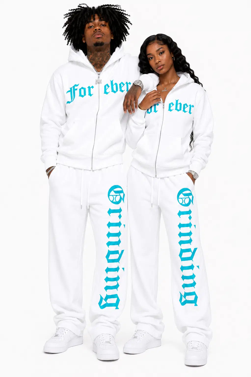 Two people wearing matching white outfits with turquoise text on a white background