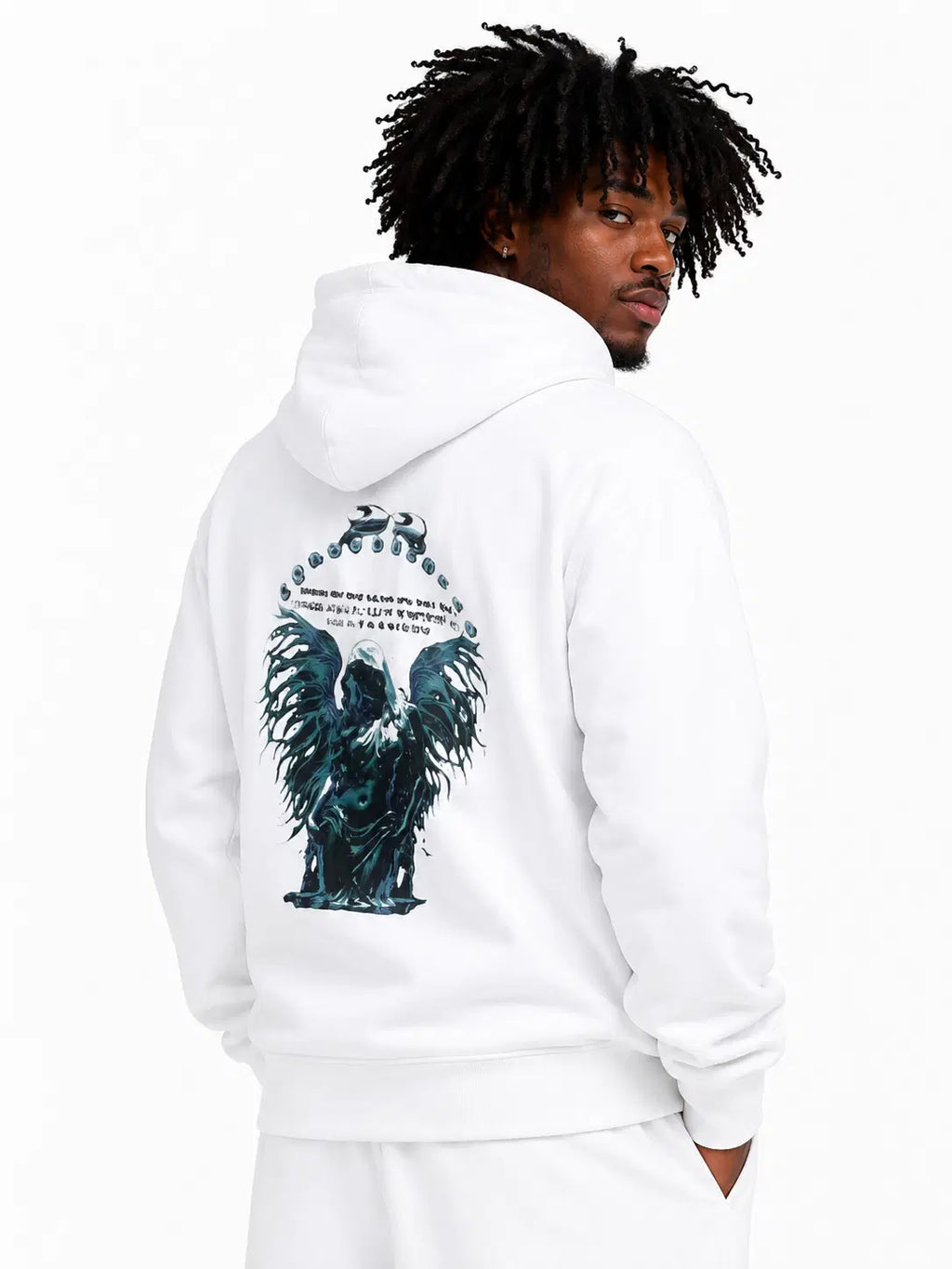 Person wearing a white hoodie with an eagle design on the back against a white background